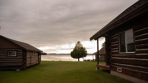 Cabin on the lawn by the lake